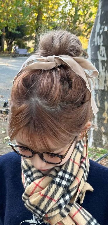 On Trend Bow Hairstyles For A Chic And Playful Look Top Knot Bun With