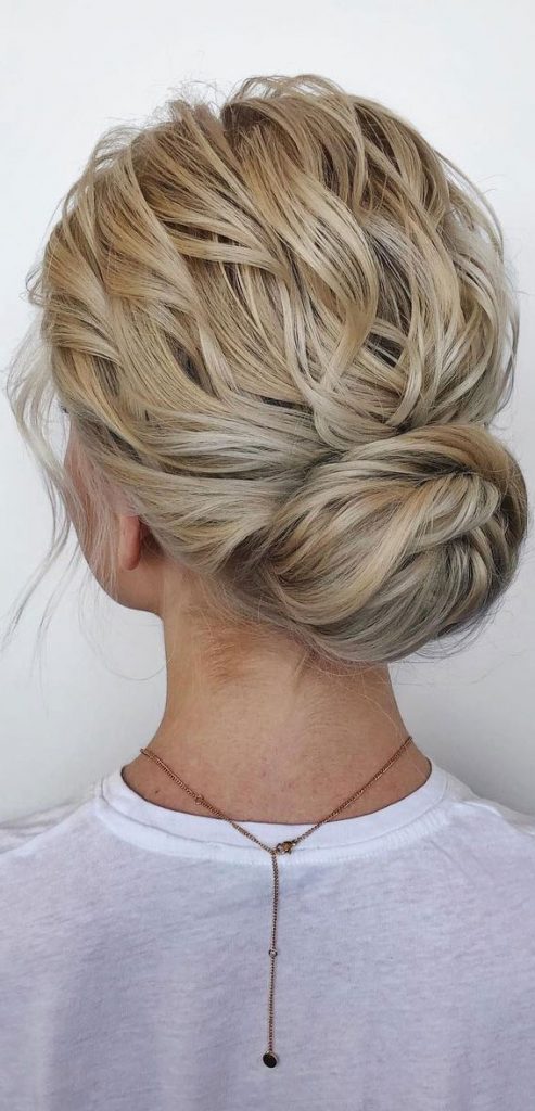 75 Trendiest Updo Hairstyles 2021 Timeless Texture And Twisted Low Bun 5501