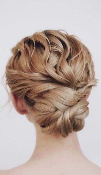 75 Trendiest Updo Hairstyles 2021 : Trendy textured updo with a cute accent