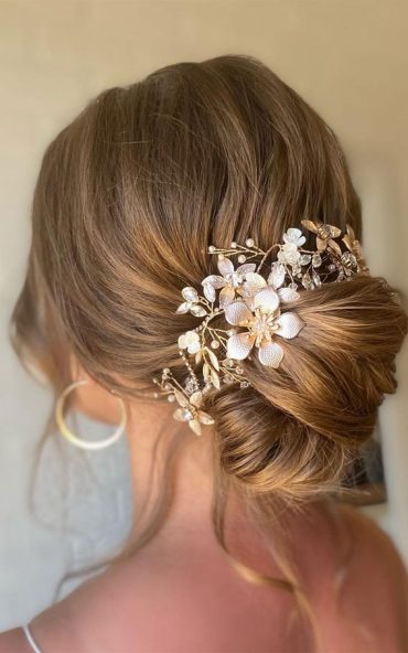 Sophisticated Updos For Any Occasion – Modern Chignon With A Twist