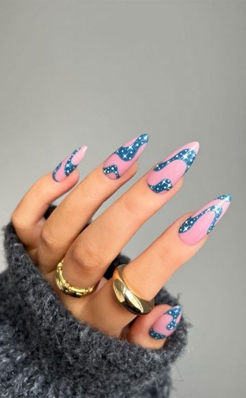 35 Nail Trends 2023 To Have On Your List Starry Swirl Almond Nails