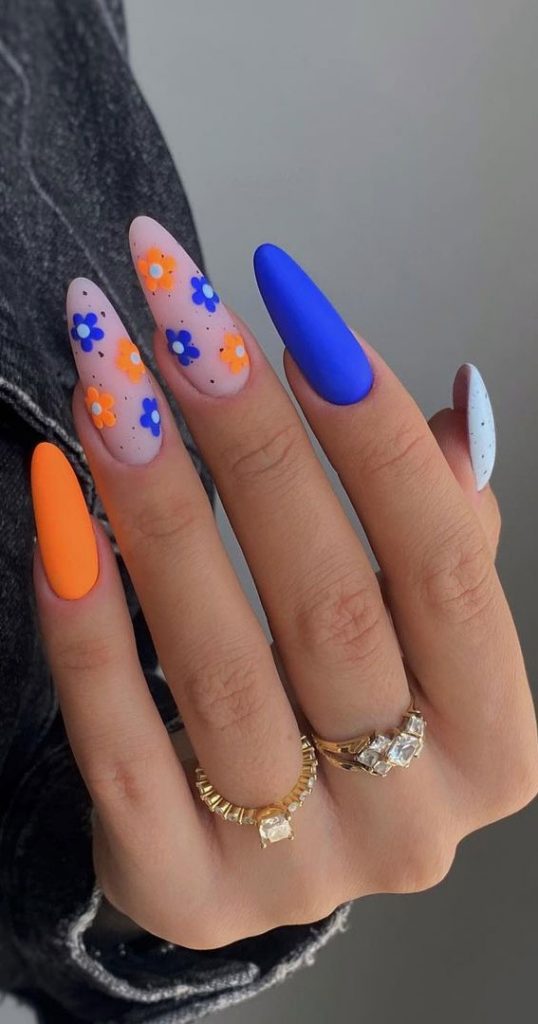 Light Up Your Nails With Electric Energy For Summer Electric Blue Orange Nails