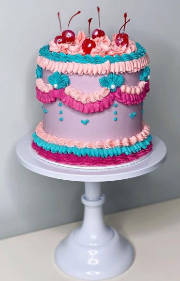 47 Buttercream Cake Ideas For Every Celebration Lambeth Cake With Cherries On Top 1411