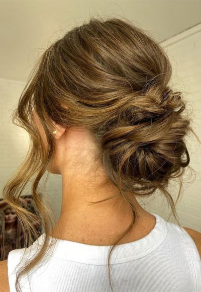 30 Stunning Bridesmaids Hairstyles For 2024 : Relaxed Messy Low Bun