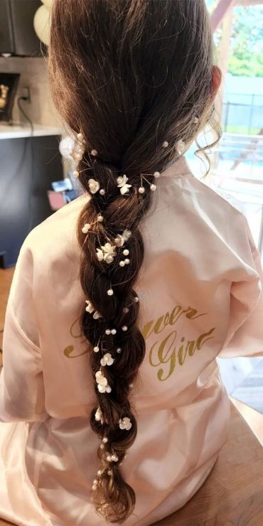 28 Enchanting Flower Girl Hairstyles : Simple Braid With Baby's Breath