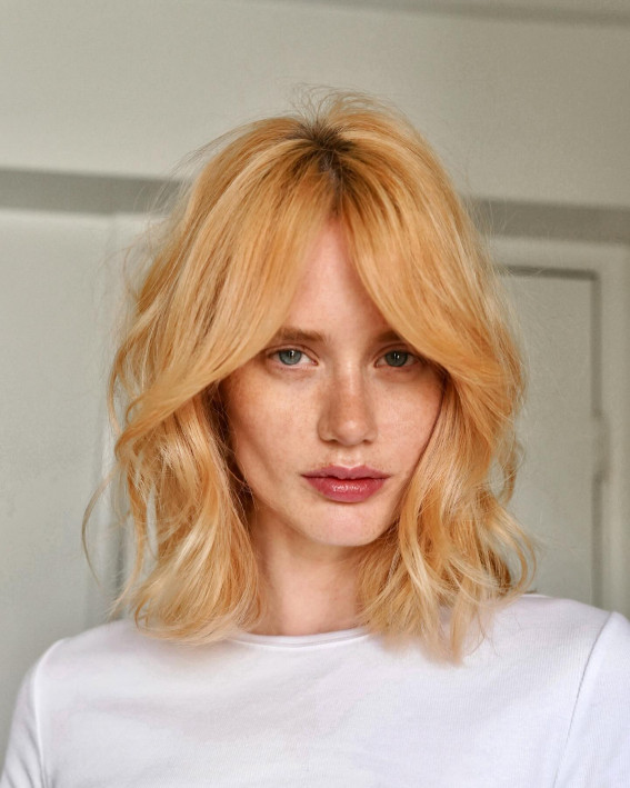 Shoulder-Length 90’s Inspired Layers on Peach-Blonde Hair Colour