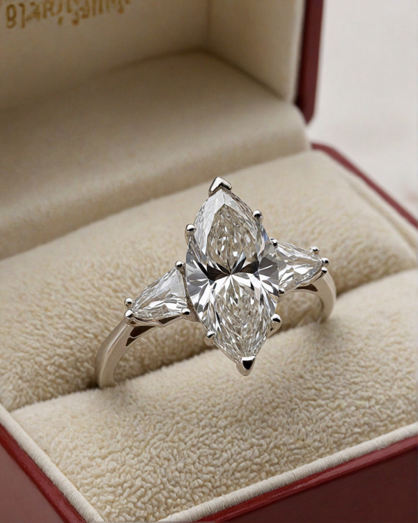 40 Dazzling Engagement Rings : Marquise-Cut Diamond Ring with Side Stones