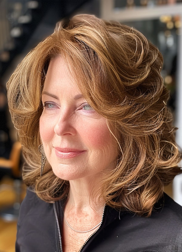 30 Medium-Length Hairstyles For Women Over 50 : Golden Brown Layers