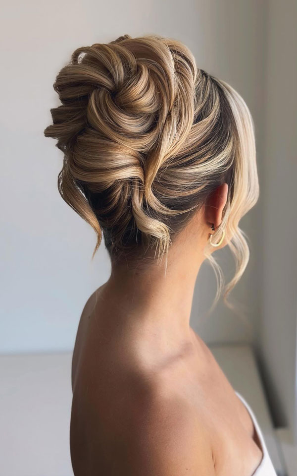 25 Stunning Updo Hairstyles for Every Occasion : Elegant Twisted High Updo