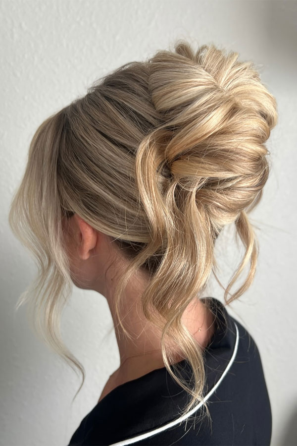 25 Stunning Updo Hairstyles for Every Occasion : Elegant Twisted Updo with Soft Waves