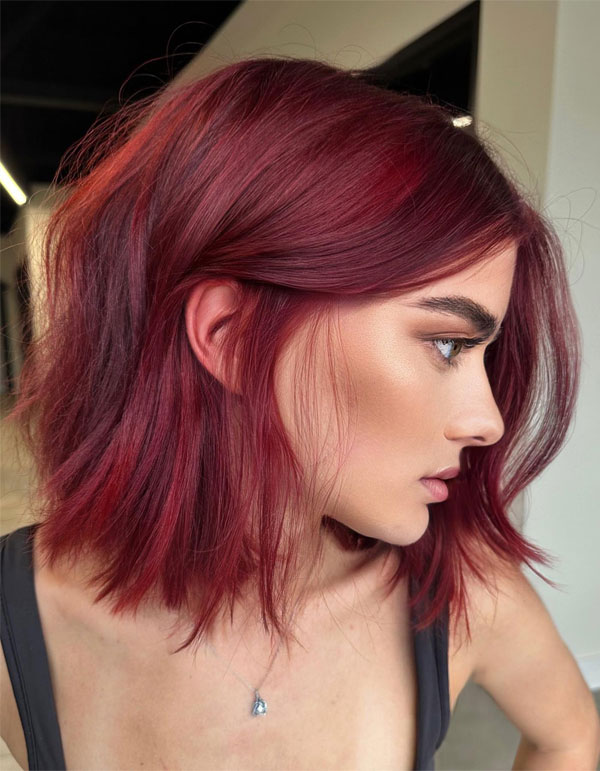 Rich Ruby Hues on Textured Lob Haircut, red hair shade, fall hair color, autumn hair colour