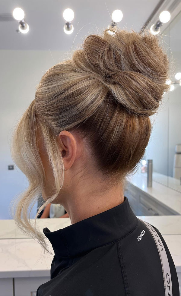 25 Stunning Updo Hairstyles for Every Occasion : Textured High Bun with Face-Framing Curls