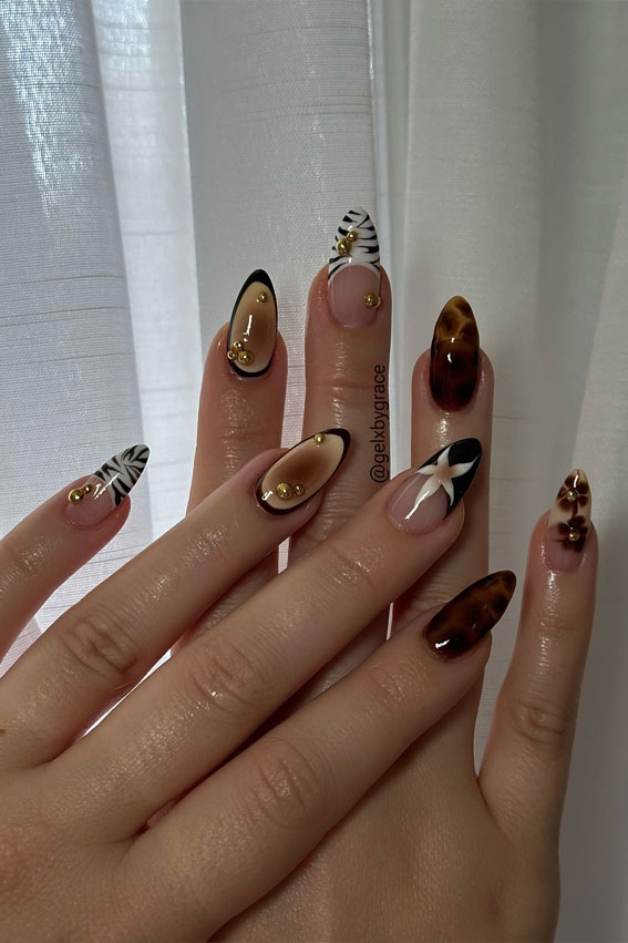 Wild Animal Print Mix, stylish autumn nails, autumn nail art, autumn nail designs, trendy fall nails