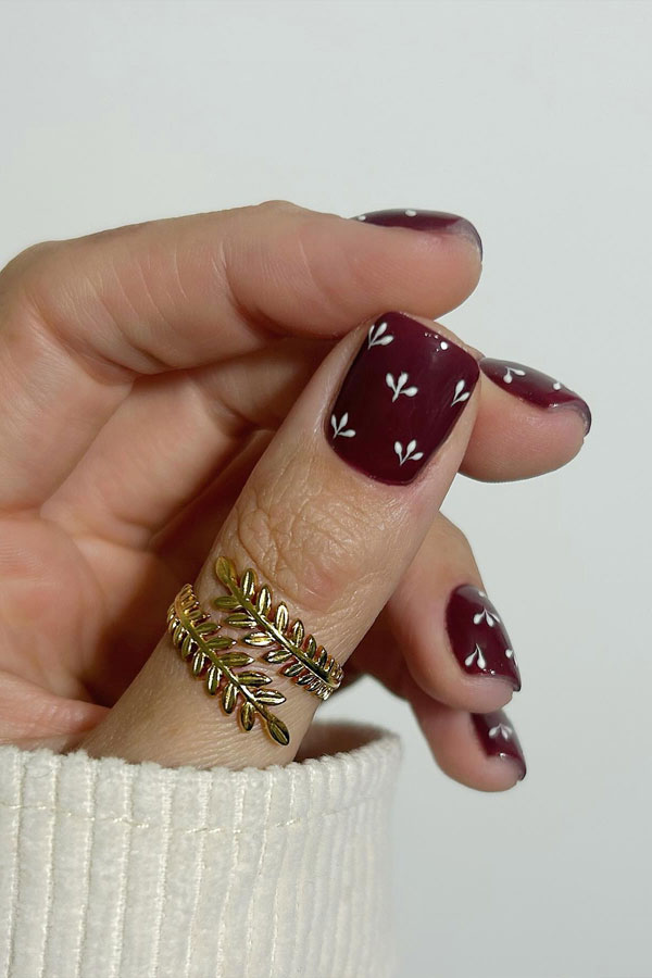 30 Cute Autumn Nail Designs to Fall For This Season : Tiny Flowers Burgundy Short Nails