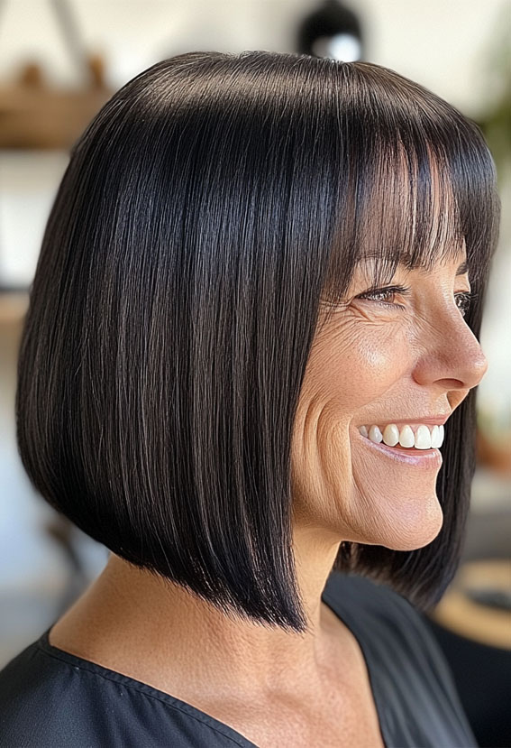 47 Bob Hairstyles for Women Over 50 : Sleek Black Bob with Blunt Bangs