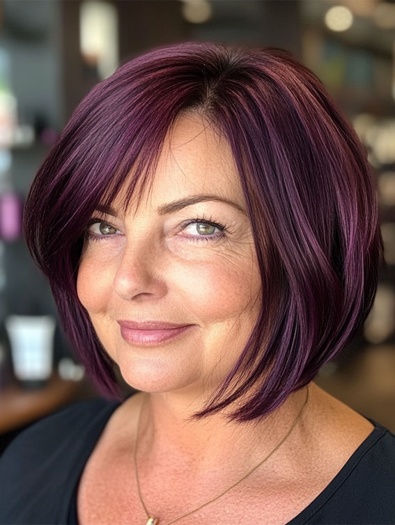 47 Bob Hairstyles for Women Over 50 : Deep Plum Bob with Sleek Side Fringe