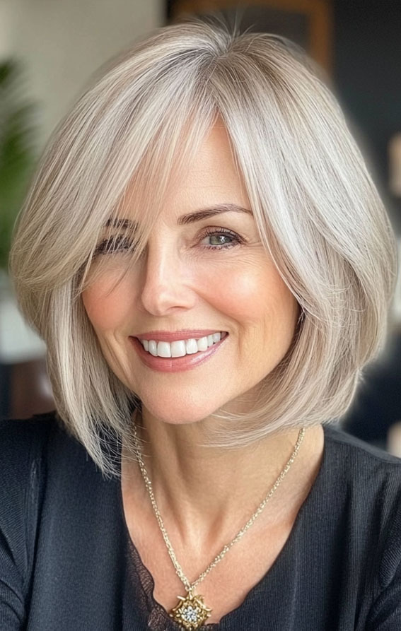 47 Bob Hairstyles for Women Over 50 : Champagne Blonde Bob with Side-Swept Layers