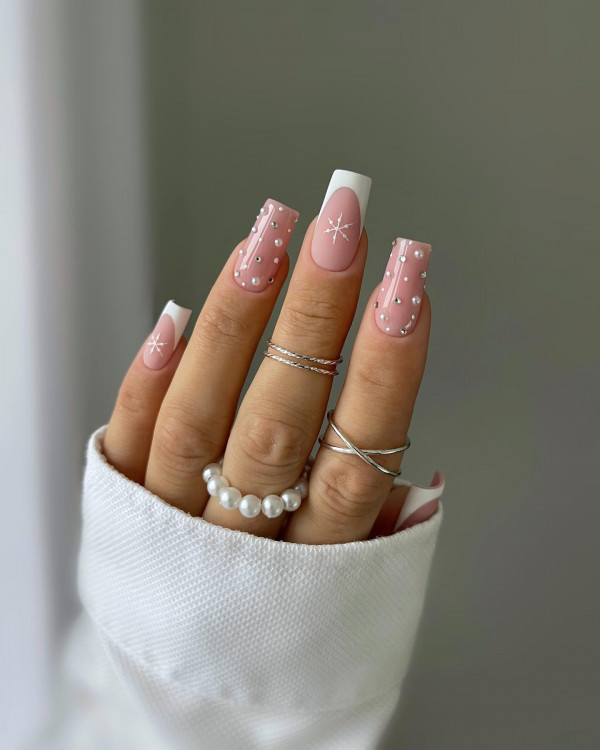 Nude Christmas Nails with Dainty Snowflakes, nude Christmas nails, Christmas nail art, Christmas nail ideas, Christmas nails, mix and match festive holiday nails, cute Christmas nail designs, festive holiday nails