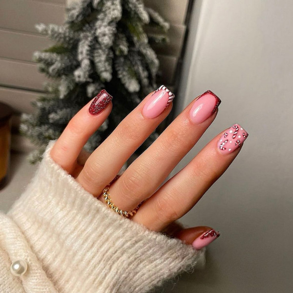 From Subtle to Sparkly Christmas Nails That Wow : Candy Cane & Shimmering Red Nails