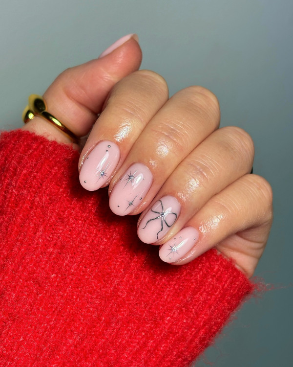 From Subtle to Sparkly Christmas Nails That Wow : Subtle Elegance Nails with Dainty Bows