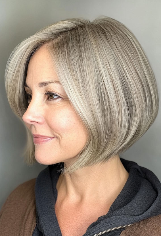 40 Layered Bob Hairstyles for Women Over 50 : Silver Bob with Smooth Layers