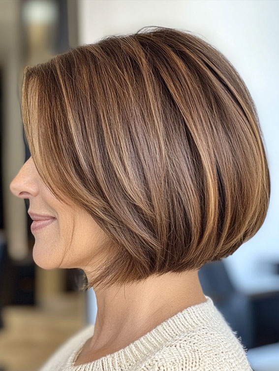 40 Layered Bob Hairstyles for Women Over 50 : Honey-Toned Layered Bob with Soft Highlights