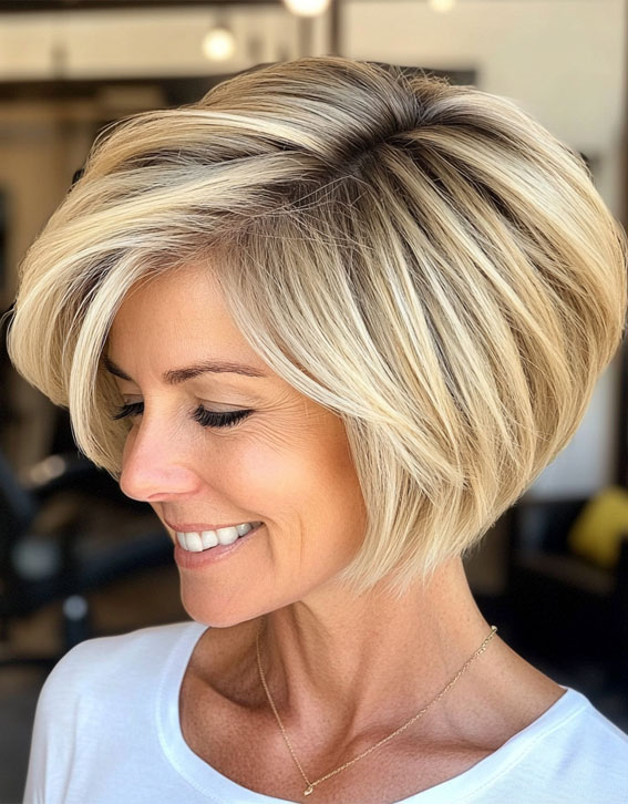 38 Pixie Bob Haircuts For Woman Over 50 : Blonde Bixie with Voluminous Layers