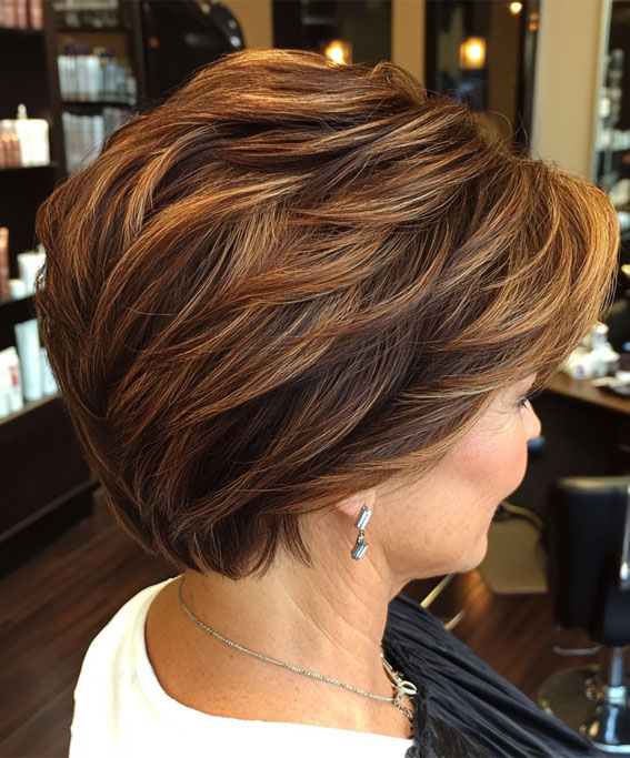 43 Chic Pixie Haircut for Women Over 50 : Layered Brunette Pixie with Caramel Highlights