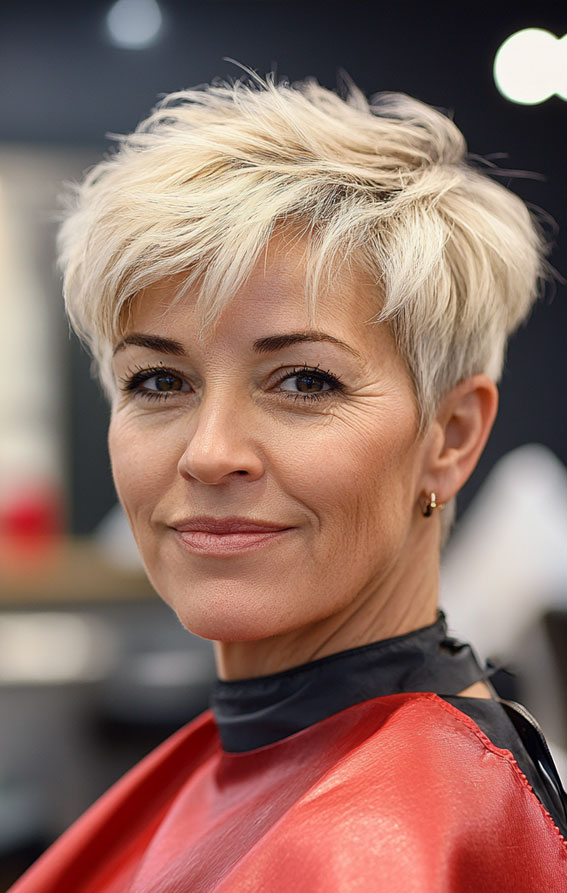 43 Chic Pixie Haircut for Women Over 50 : Layered Platinum Pixie with Side-Swept Fringe