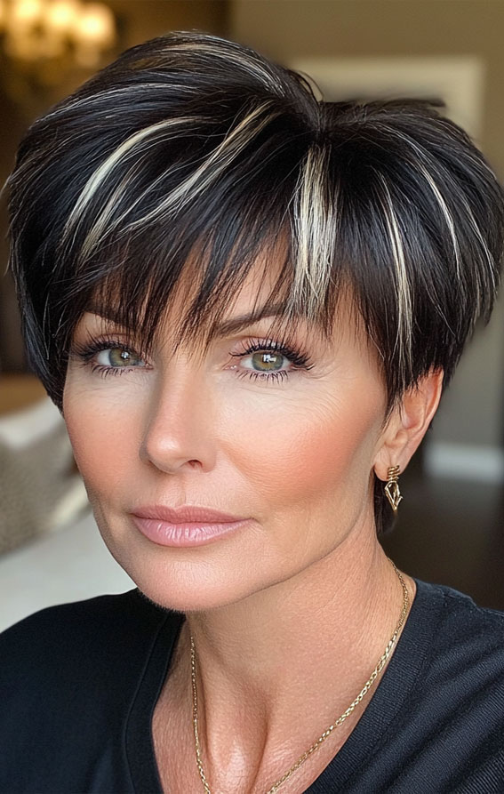 43 Chic Pixie Haircut for Women Over 50 : Bold Black Pixie with Blonde Highlights