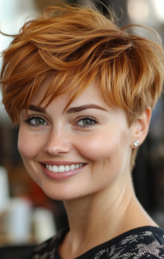 32 Pixie Haircuts For Women Over 40 : Vibrant Ginger Pixie with Playful Layers