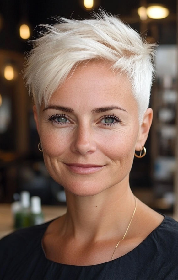 32 Pixie Haircuts For Women Over 40 : Icy Blonde Pixie with Choppy Fringe