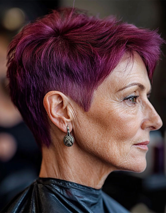 Bold Purple Pixie with Sharp Edges, Pixie Haircuts for Women Over 60, Layered pixie haircuts for Women over 60, Low maintenance pixie haircuts for women over 60, Wash and Wear Haircuts For Women Over 60, Pixie cuts for over 60 with glasses, Choppy pixie cut for over 60, Pixie hairstyles for women over 60, Long pixie haircuts for women over 60, short haircuts for women over 60