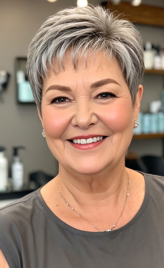 30 Pixie Haircuts for Older Women with Fringe : Sleek Salt-and-Pepper Pixie with Tapered Layers