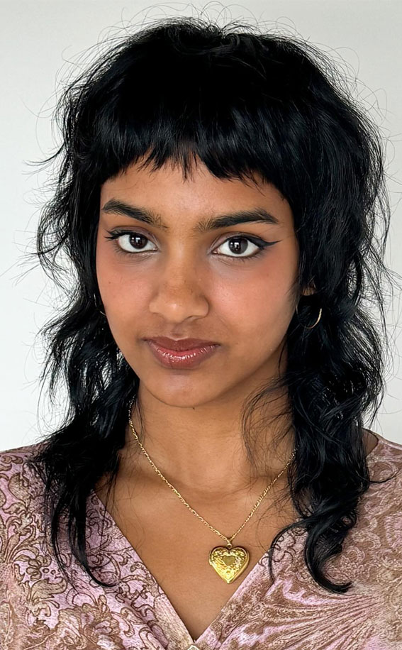 40 Fierce & Fabulous Wolf Haircut Ideas : Textured Layers with Choppy Fringe