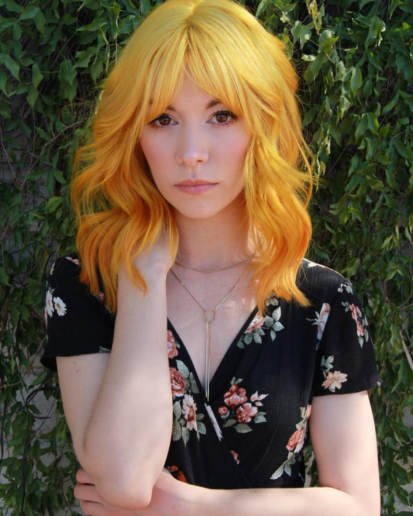 20 Radiant Marigold Hair Colour Ideas : Golden Marigold Shoulder Length with Feathered Bangs