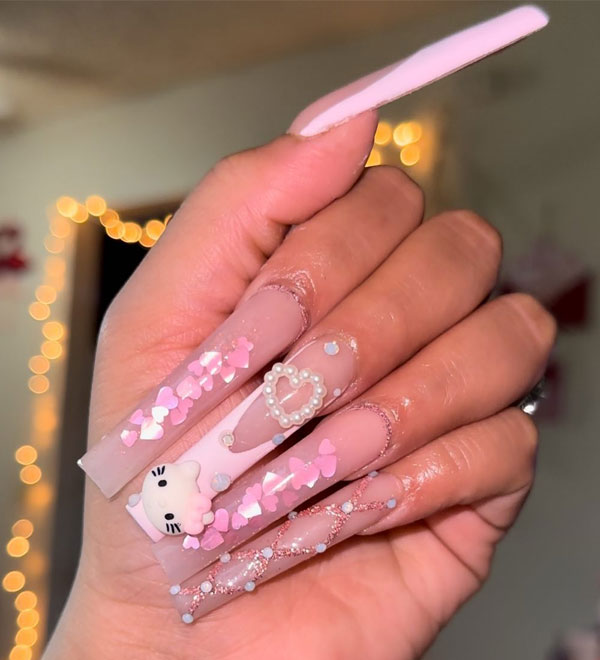 20 Hello Kitty Nails for Valentine’s Day : Extra Long Coffin-Shaped Nails with Heart Charm