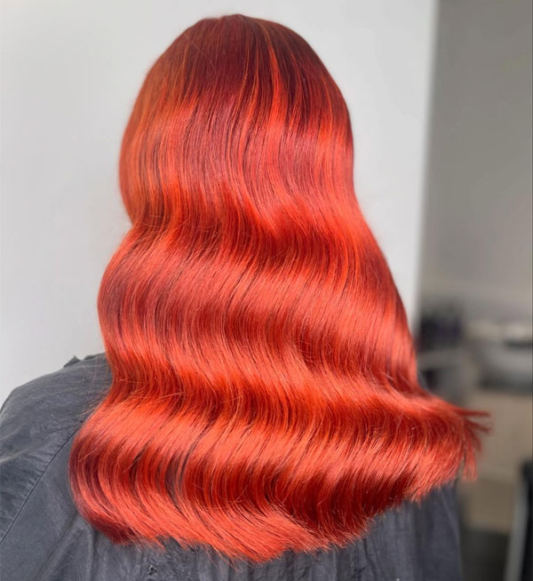 25 Red Hair Colour Ideas for a New Look: Glossy Vibrant Red Retro Waves