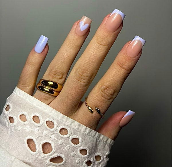 20 Minimalist Valentine’s Day Nail Designs : Lavender French Tips with Heart Accent