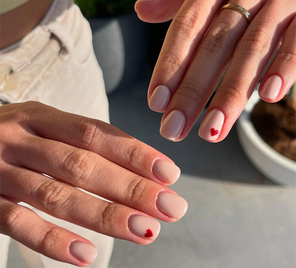 20 Minimalist Valentine’s Day Nail Designs : Minimal Nude Nails with Tiny Hearts