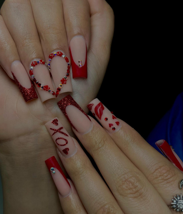 Valentine's Day Nail Art with Hearts and Glitter