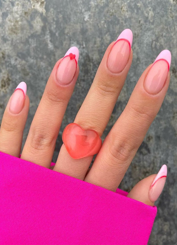 pink and red french tip nails, valentine's day nails 2022, red heart tip valentine nails, valentine nails, pink love heart nails, love heart french tip nails, valentine nails 2022, heart nails 2022, heart tip nails, heart nails brown, red valentine nails, pink nails 2022