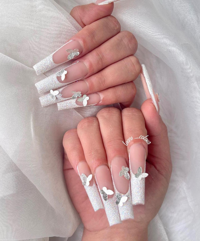 40 Cute Acrylic Nails To Wear This Spring White French Tip Acrylic Nails With Silver Butterflies I Take You Wedding Readings Wedding Ideas Wedding Dresses Wedding Theme
