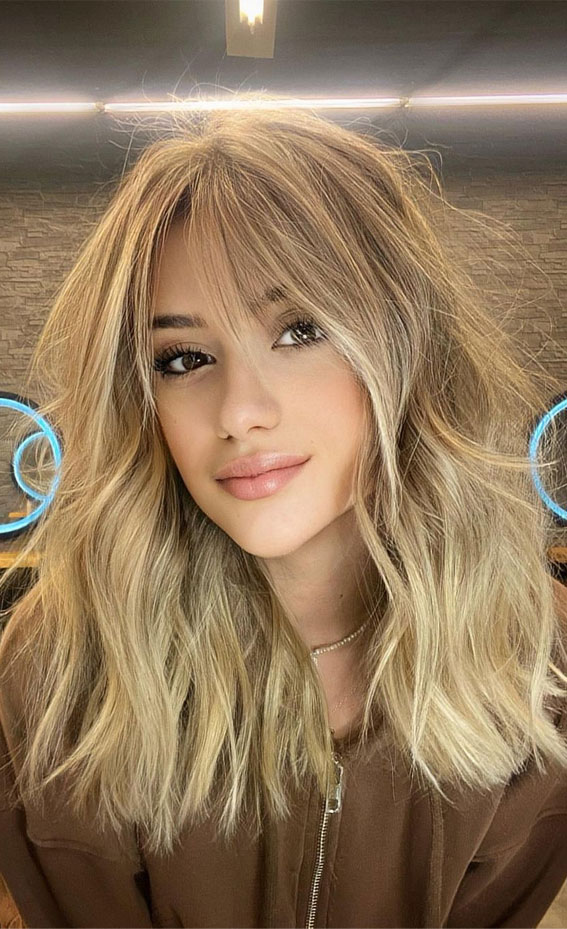 37 Best Blonde For Medium Length Haircuts : Beach Cool Blonde with Wispy Curtain Bangs