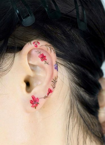 30+ Beautiful Flower Tattoo Ideas : Colourful Tiny Flower Tattoo on Ear ...