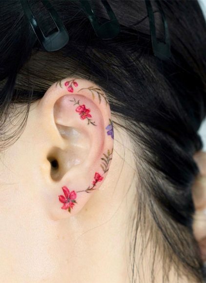 30 Beautiful Flower Tattoo Ideas Colourful Tiny Flower Tattoo On Ear   Flower Tattoo 8 422x580 