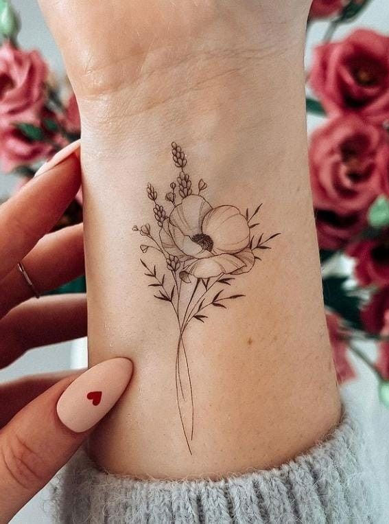 30+ Beautiful Flower Tattoo Ideas : Poppy Tattoo Above Wrist