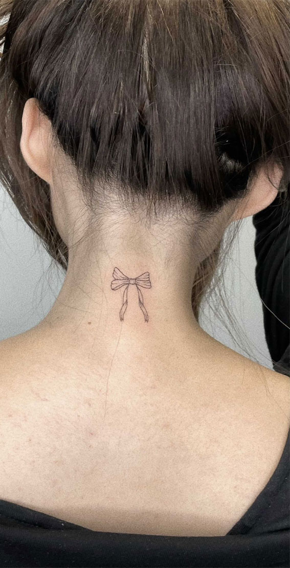 50 Small Tattoo Ideas Less is More : Little Bow Neck Tattoo
