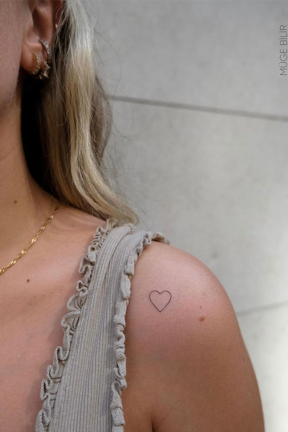 Ink Fusion Where Art and Identity Meet : A Heart Tattoo on Shoulder