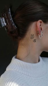 Whispered Ink 40 The Beauty of Ear Tattoos : Two Butterflies Behind Ear ...